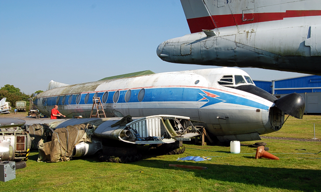 Dave Waters, a volunteer from DAS - Duxford Aviation Society, washing the starboard side of the aircraft.