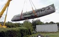 G-AZLP is hoisted into place at the North East Aircraft Museum.