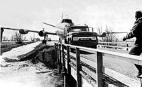 Crossing a wooden bridge across a river was carried out with the aircraft jacked u.