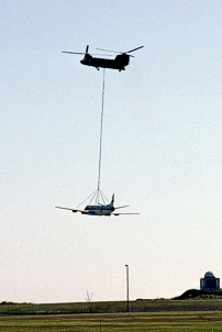 Airlifted by a Canadian Armed Forces Boeing Vertol Chinook helicopter to a nearby landfill site.