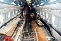Cabin interior being restored to passenger configuration.