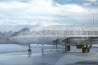 Photo of the CF-THG being foamed down by the Vancouver Airport Fier Service
