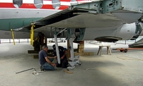 Photo of the starboard undercarriage being refitted